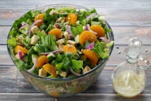 mandarin salad mixed together in a large bowl