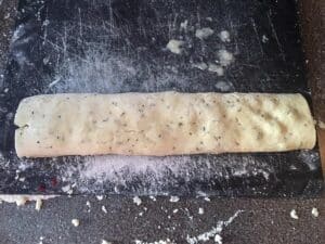 dough rolled right up over berries