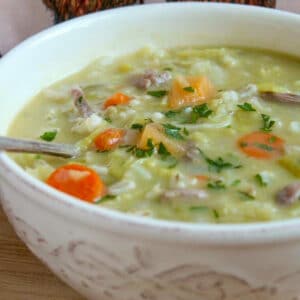 Scotch Broth Soup in a white bowl with spoon