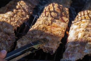 raw ribs on grill