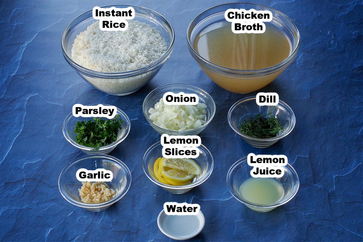 ingredients for Greek rice, labelled in glass bowls