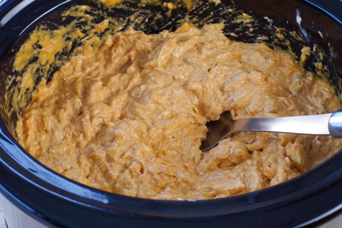 Halloween buffalo chicken dip ingredients mixed together