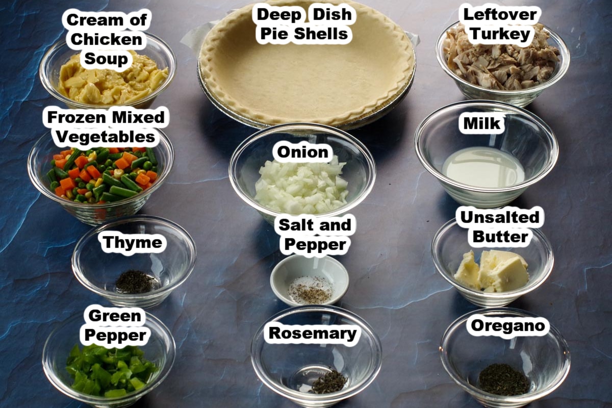 turkey pot pie ingredients in glass bowls with labels