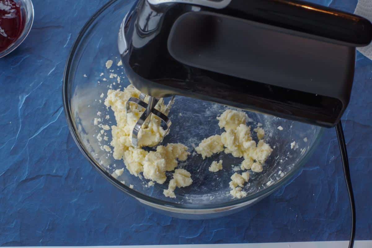 butter beaten with electric mixer, in large glass bowl