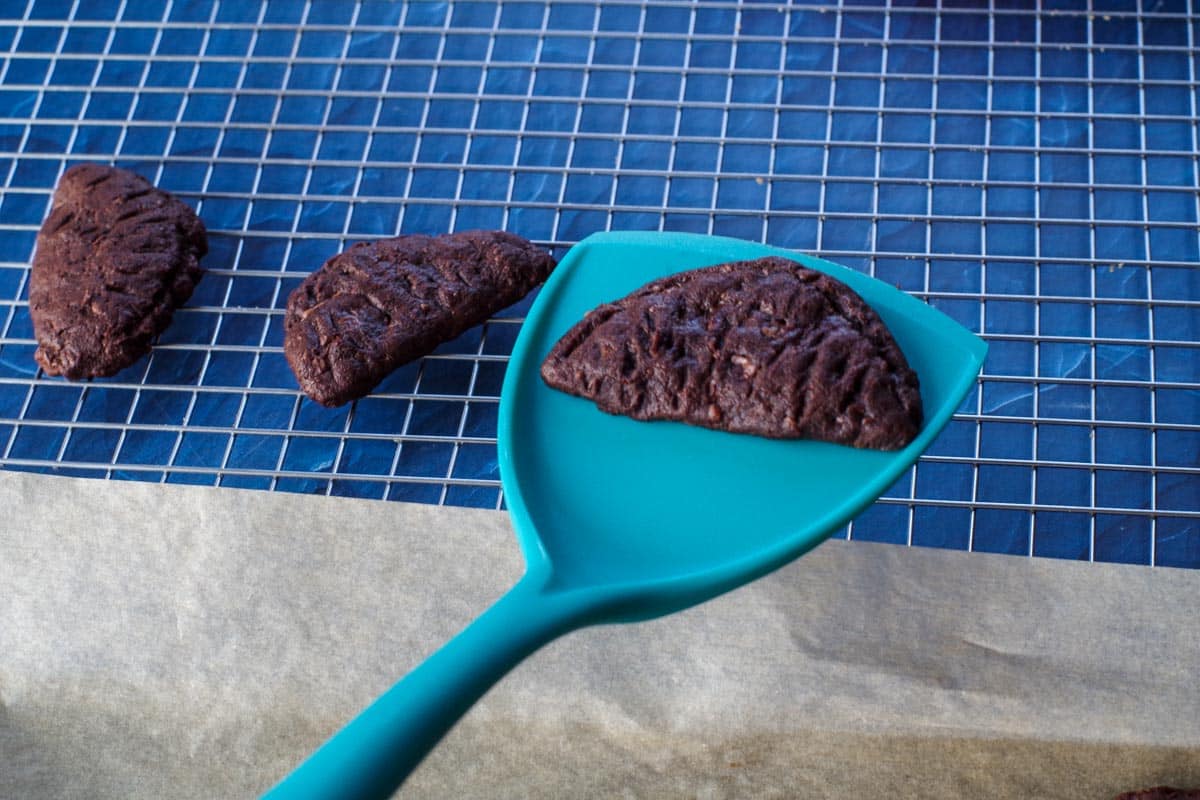 cookie being lifted on a spatula