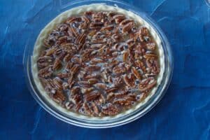 syrup/egg mixture poured over pecans in pie crust