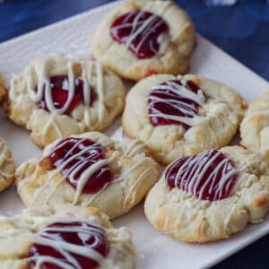 8 white chocolate raspberry cookies on a white plate