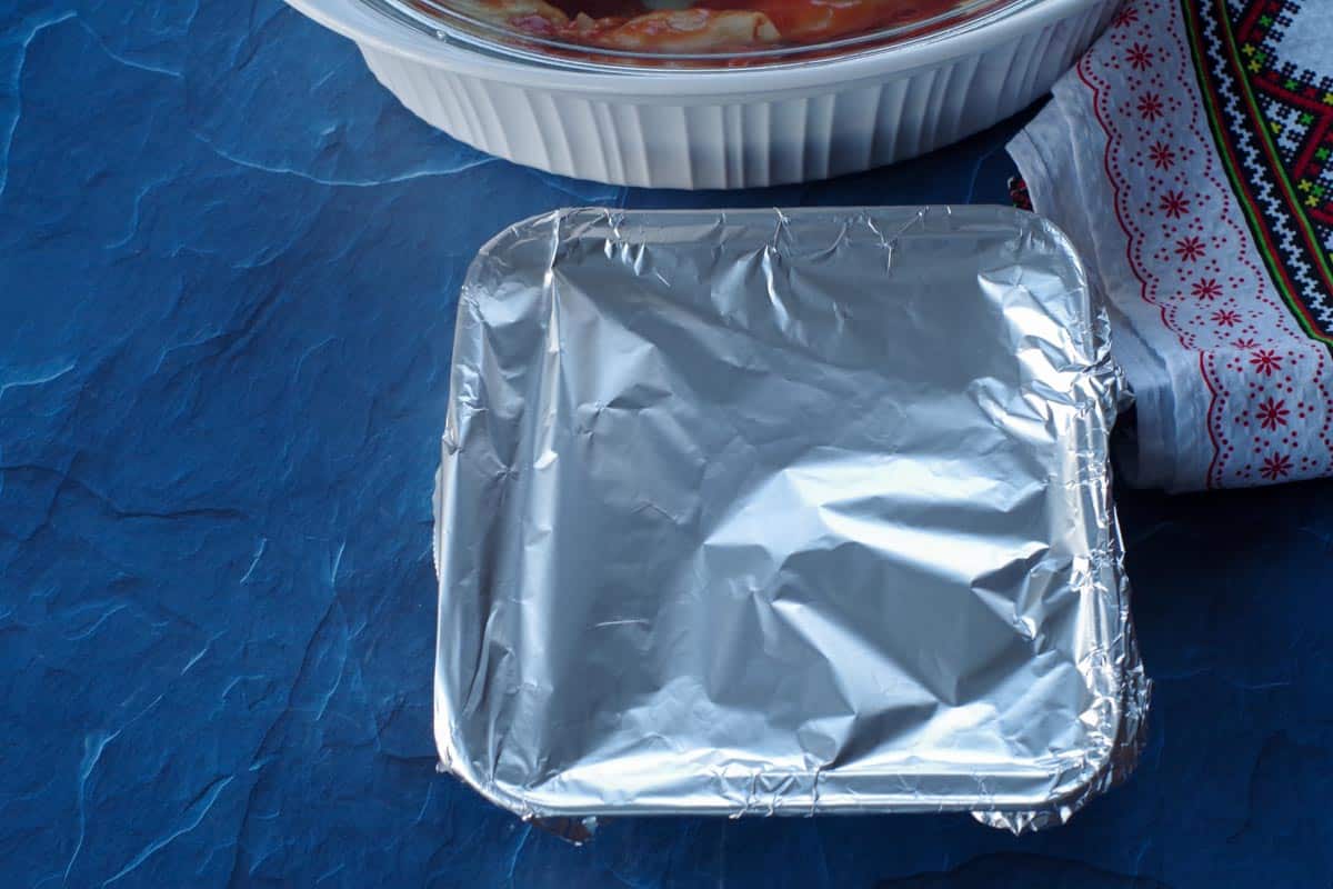 casserole covered with aluminum foil