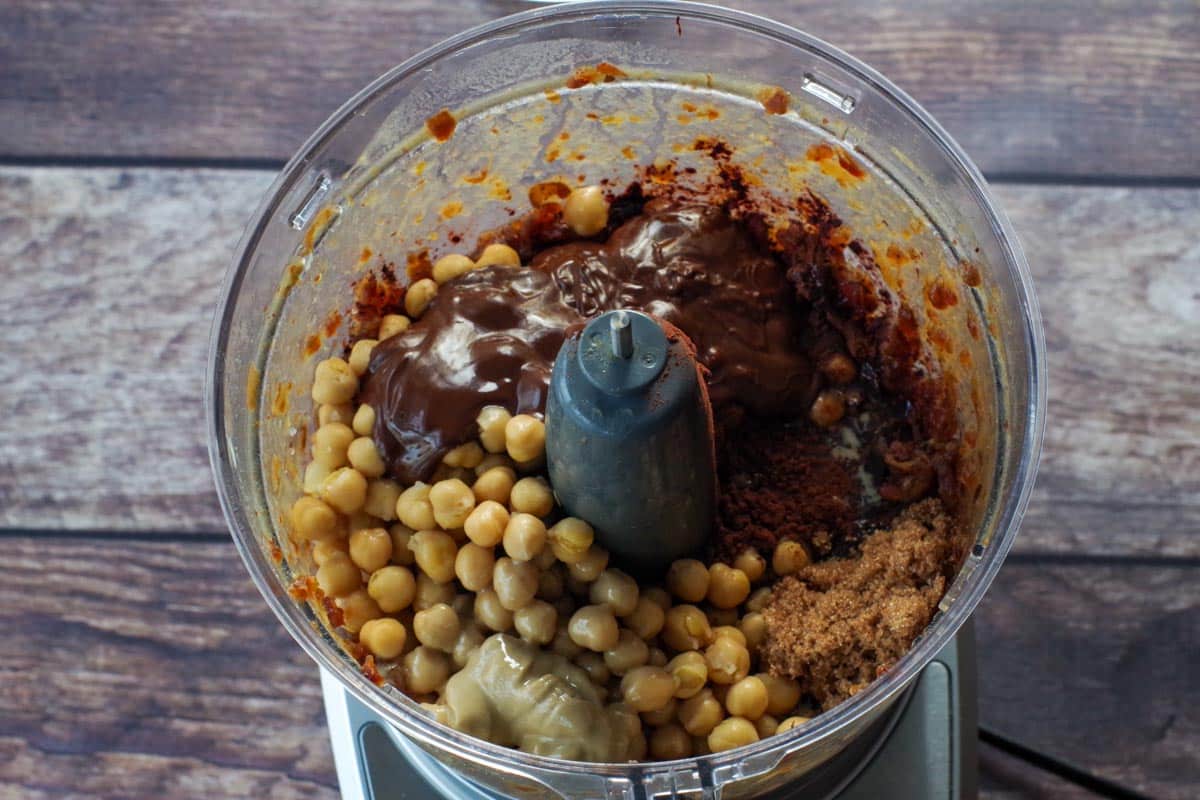 All chocolate hummus remaining ingredients (except chocolate chips) in bowl of food processor