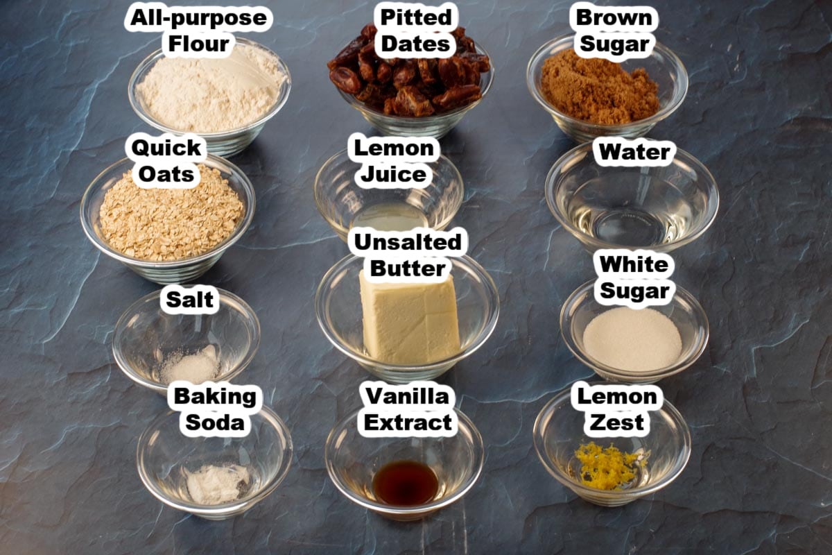 ingredients in date squares in glass bowls, labelled