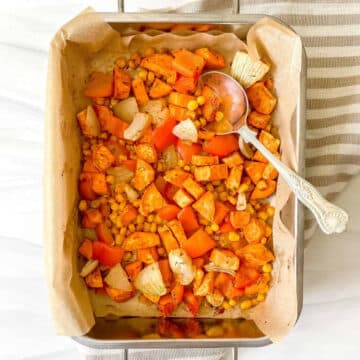 overhead view of sweet potato corn hash in a pan lined with parchment