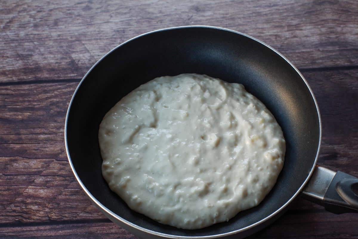 pancake batter in pan