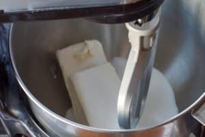 cream cheese and sugar in stand mixer