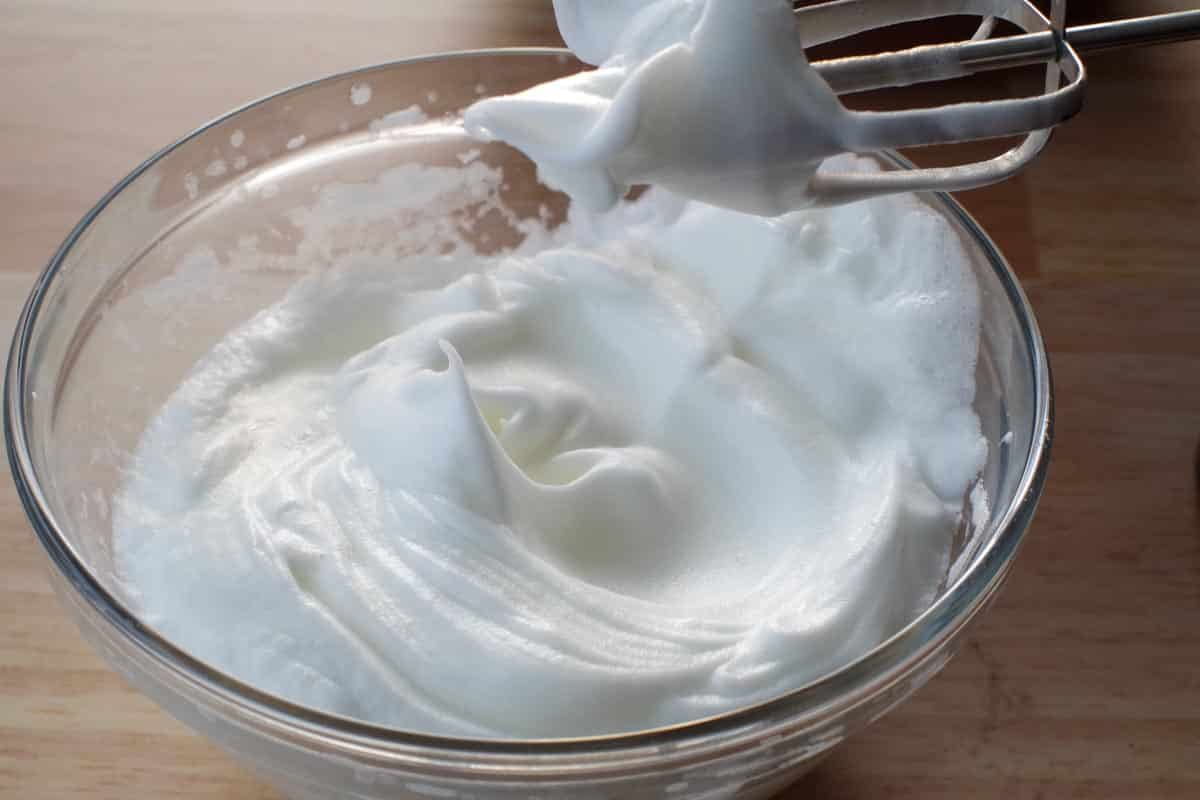 egg whites beaten to stiff in a glass bowl