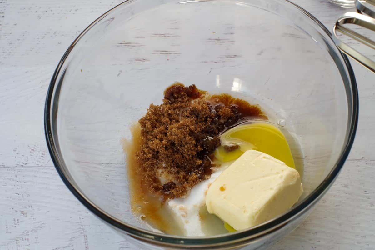 sugars, butter, egg and vanilla extract in a glass bowl