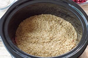 rice on top of ground beef in crock pot