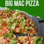 whole big mac pizza with piece being lifted out