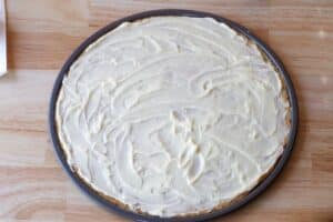 Cream cheese topping on cooled crust