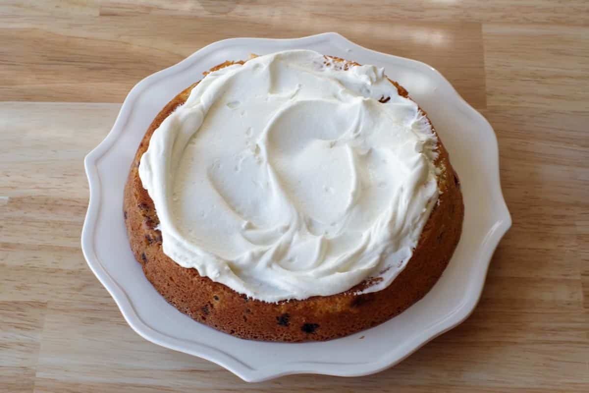 whipped cream frosting on bottom cake