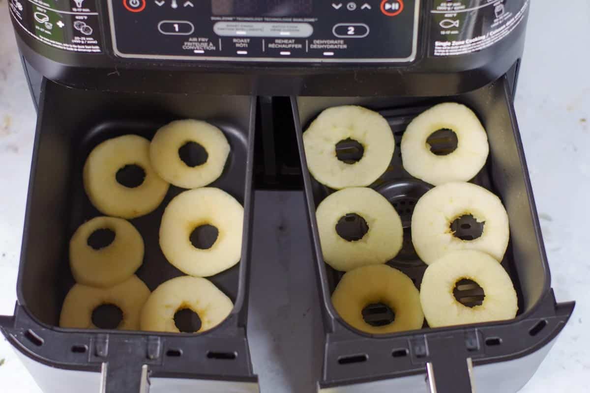 apple slices in air fryer drawers in single layer