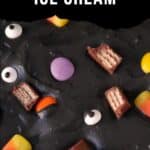 black ice cream with cookies and candies and candy eyeballs