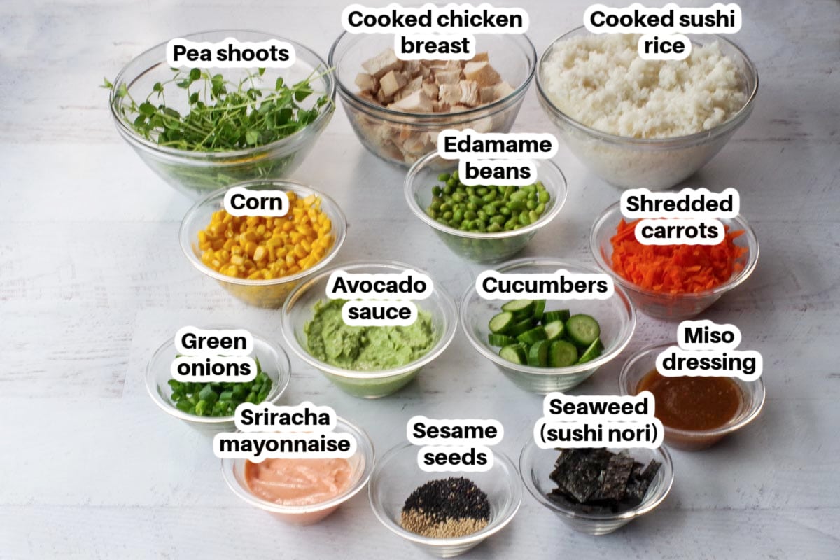 ingredients in chicken poke bowls labelled in glass bowls
