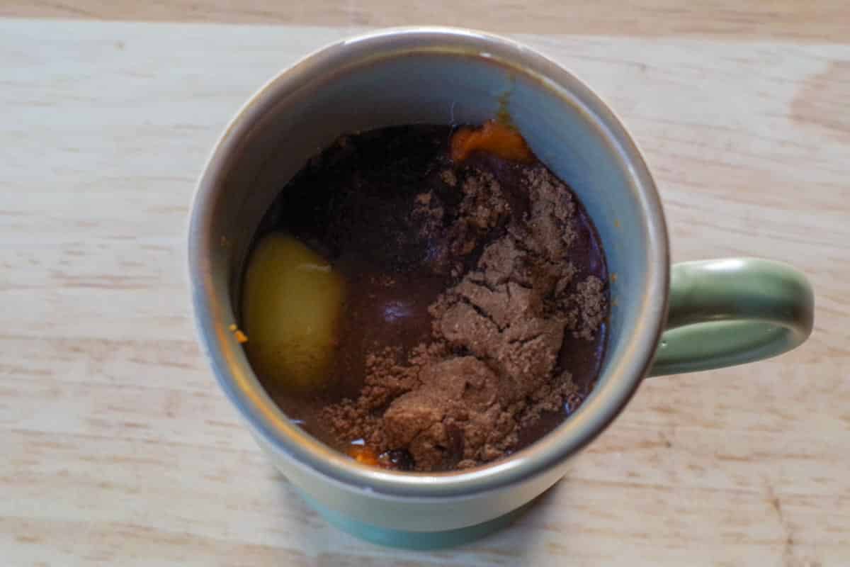 all crustless pumpkin pie in a cup ingredients added to mug