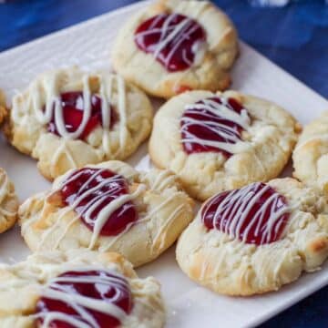 white chocolate raspberry cookies on a white plate