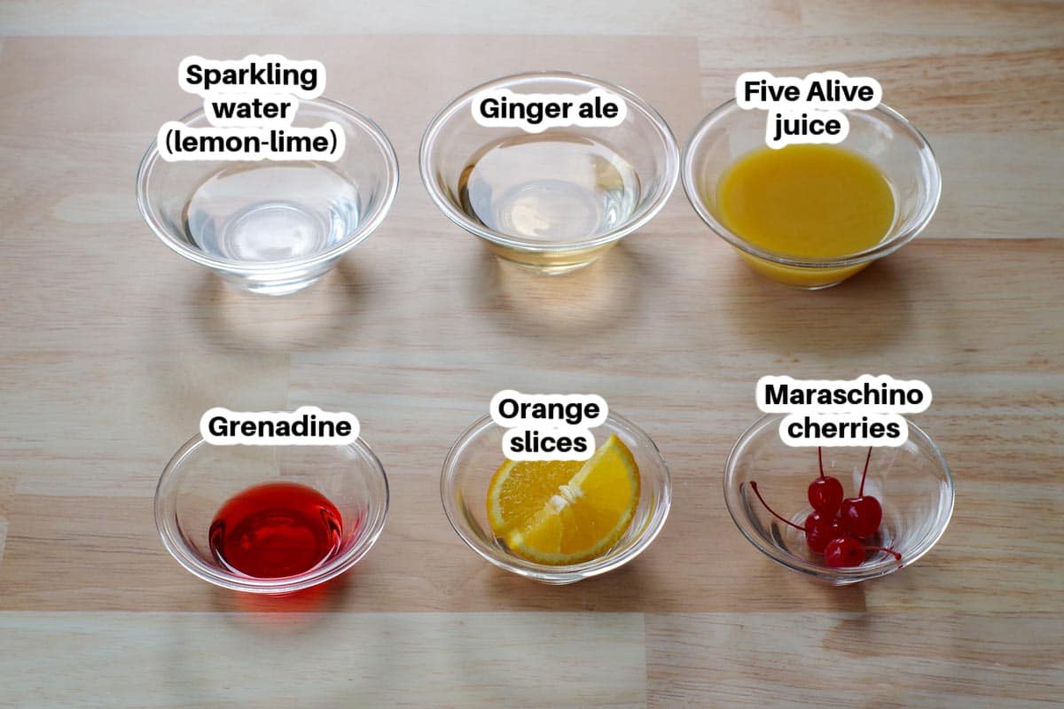 Ingredients in a Shirley Temple Mocktail labelled, in glass bowls.