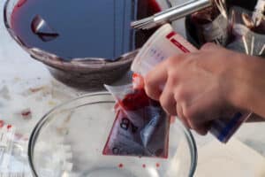 blood bag being filled to top with punch