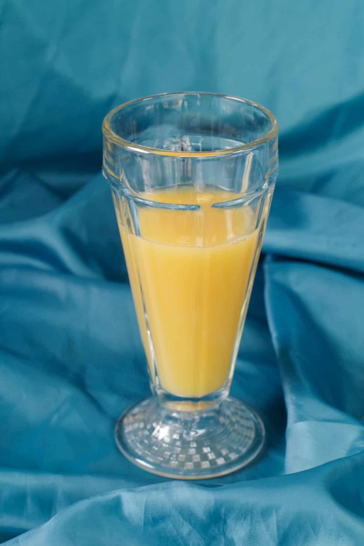 1 part orange juice added to glass