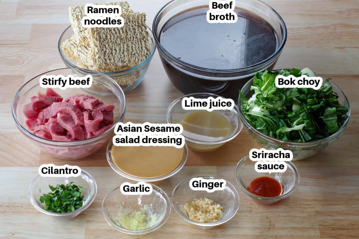 Ingredients in Asian Sesame beef noodle soup in glass bowls, labelled
