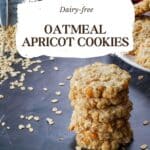 stack of Oatmeal Apricot cookies, with more cookies on a white plate in the background
