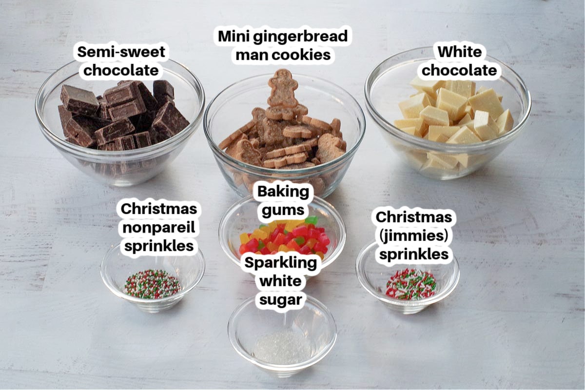 ingredients in Christmas chocolate bark in glass bowls, labelled
