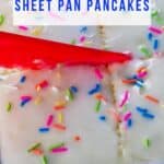 Sugar cookie sheet pan pancakes being cut into with a nylon knife
