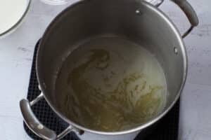 butter melted in large pot