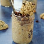 overnight oats with raisins with oatmeal cookies and more jars in the background
