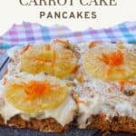 carrot cake pancake being lifted off a sheet pan with a blue, yellow and pink checkered tea towel in the background