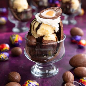 Easter Egg Sundae on purple background surrounded by Cadbury Easter Creme Eggs