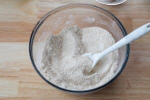 Flour, sugar, salt and baking soda in mixing bowl