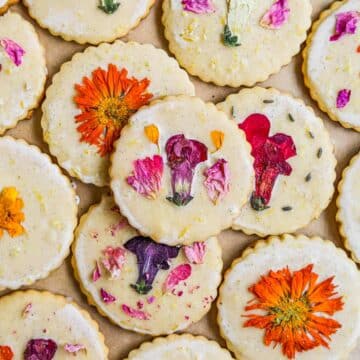 Edible flower shortbread cookies piled together