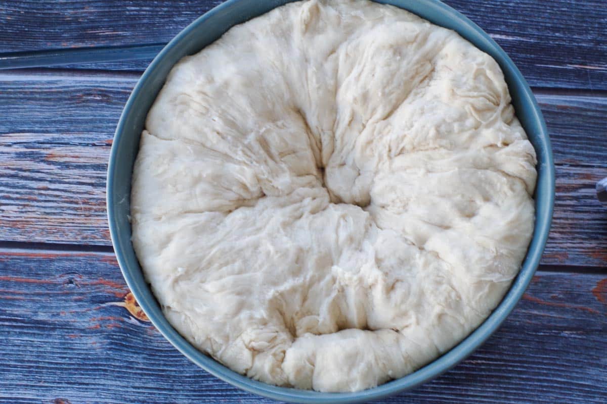 dough punched down in bowl