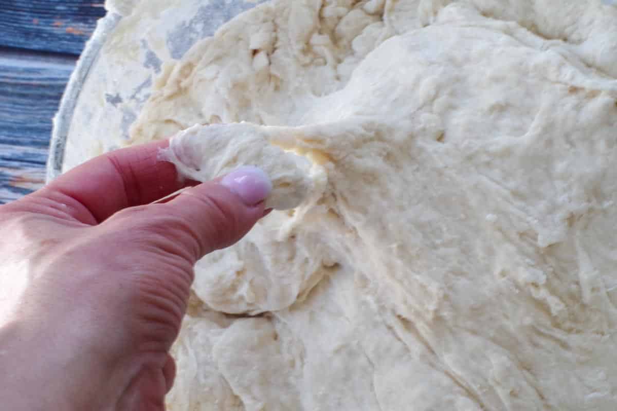 finger feeling dough texture