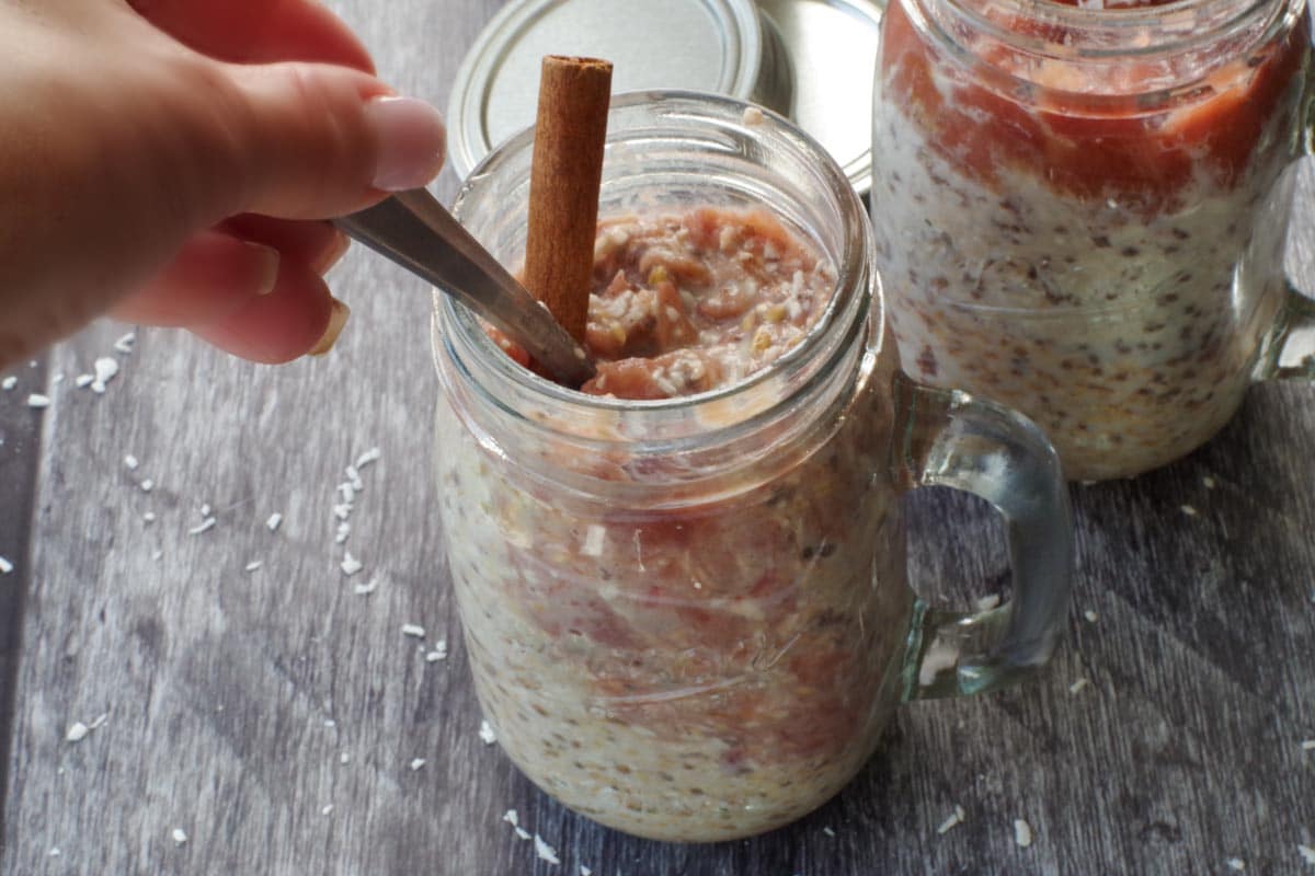 rhubarb overnight oats being stirred