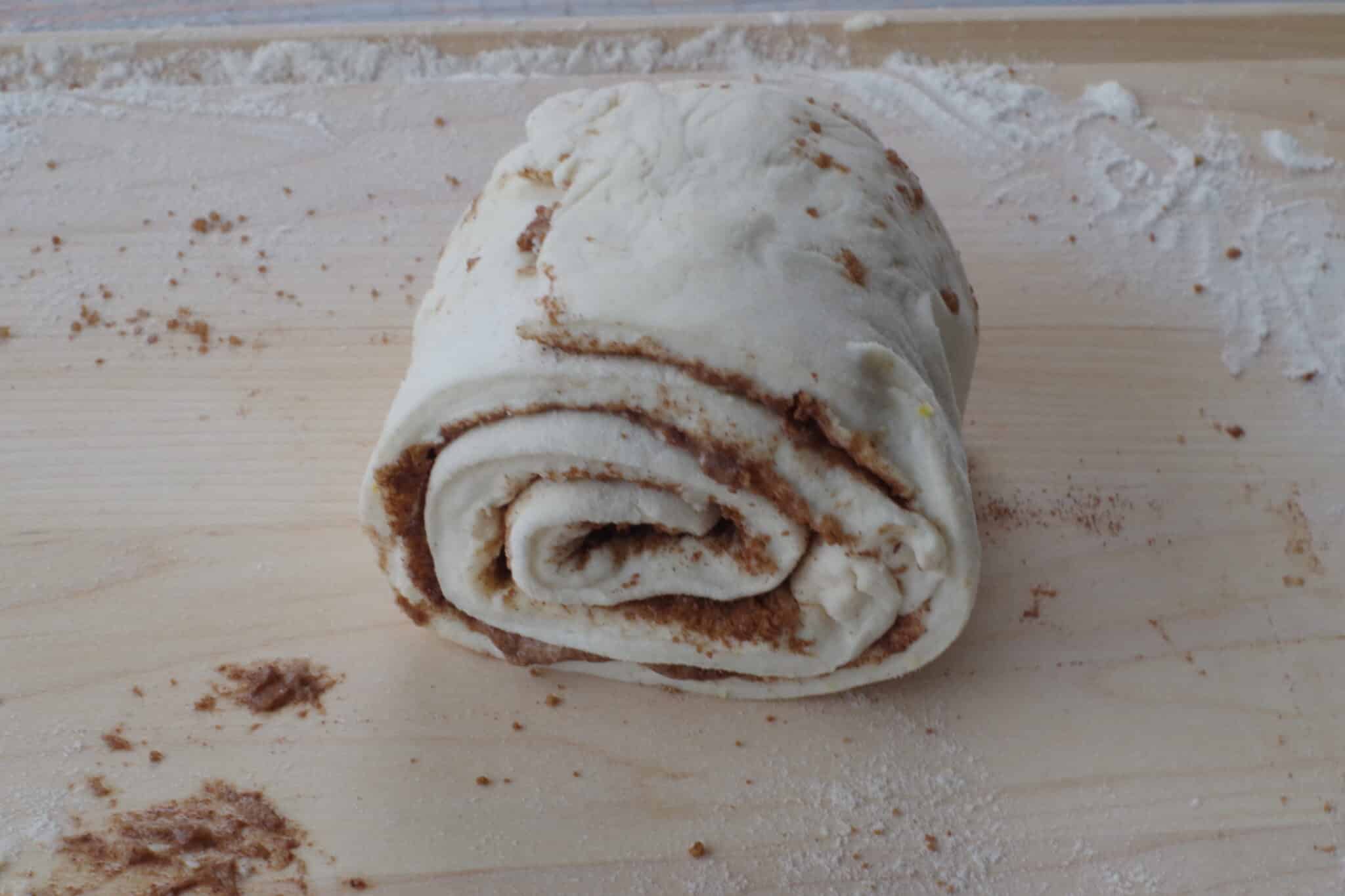 2 strips of dough rolled all the way up
