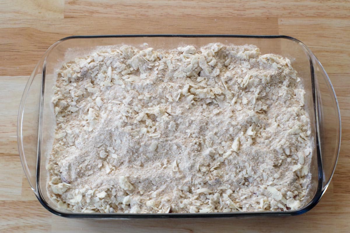 crumble spread evenly over rhubarb mixture in glass pan