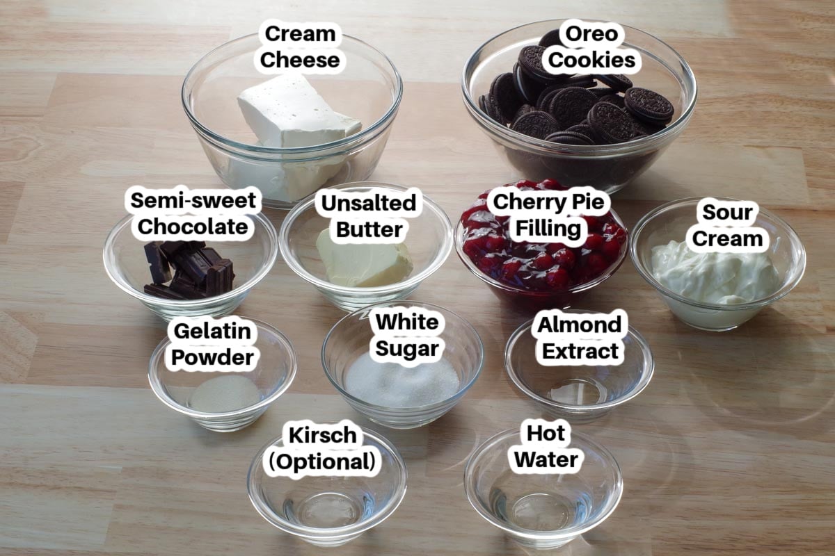 no bake black forest cheesecake ingredients in glass bowls, labelled