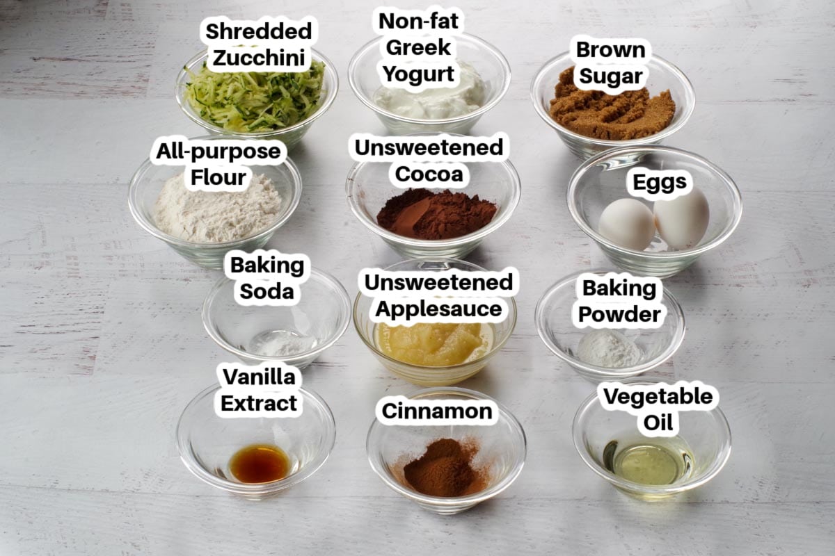 ingredients in WW Zucchini Muffins in glass bowls, labelled