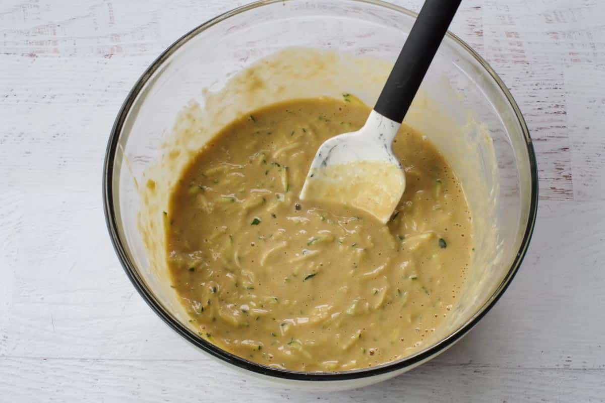 shredded zucchini stirred into large glass bowl