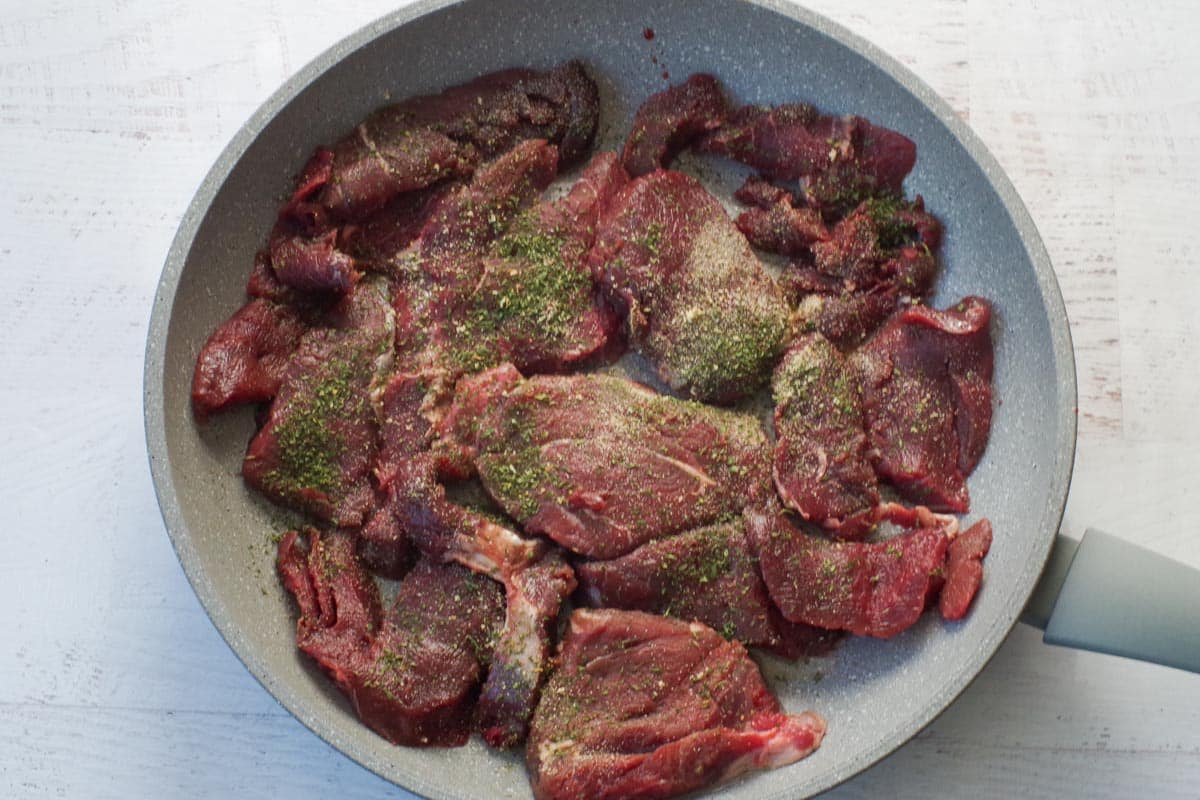 meat added to skillet and sprinkled with remaining parsley and garlic powder